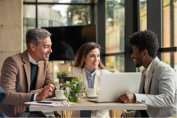 Professionals reviewing a comprehensive financial plan focused on asset protection, estate planning, insurance, and long-term risk management.